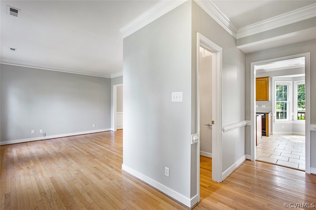 13902 Sagebrook Road Midlothian, VA 23112 - Photo 4 of 37 an empty room with wooden floor & windows
