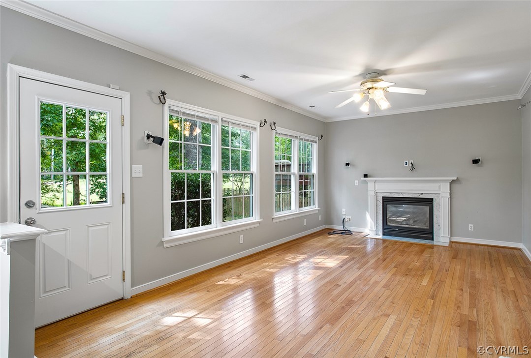 13902 Sagebrook Road Midlothian, VA 23112 - Photo 5 of 37 a view of an empty room with window and fire place