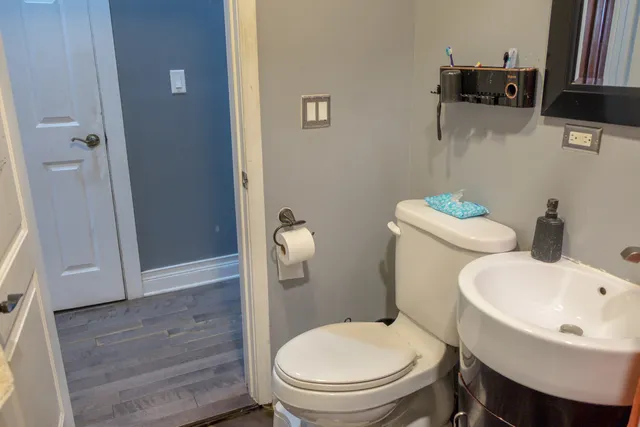 a dining room with a table and chairs