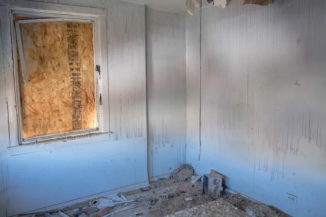 a view of a building with a window and door