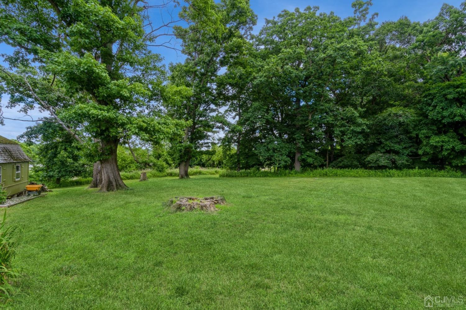 14 Bowser Road New Brunswick, NJ 08901 - Photo 29 of 40 a view of a green field with wooden fence