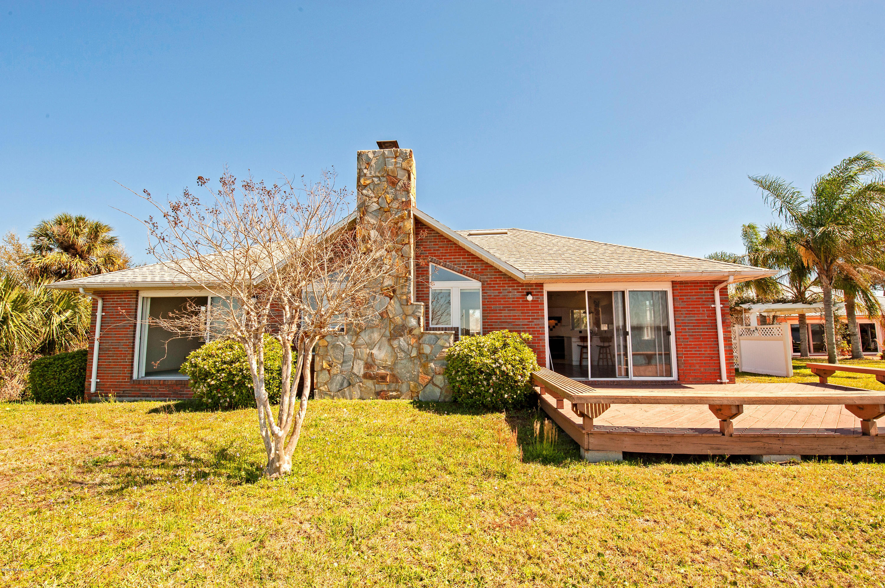 6333 Salado Road St. Augustine, FL 32080 - Photo 27 of 33 a view of a house with snow on the wall