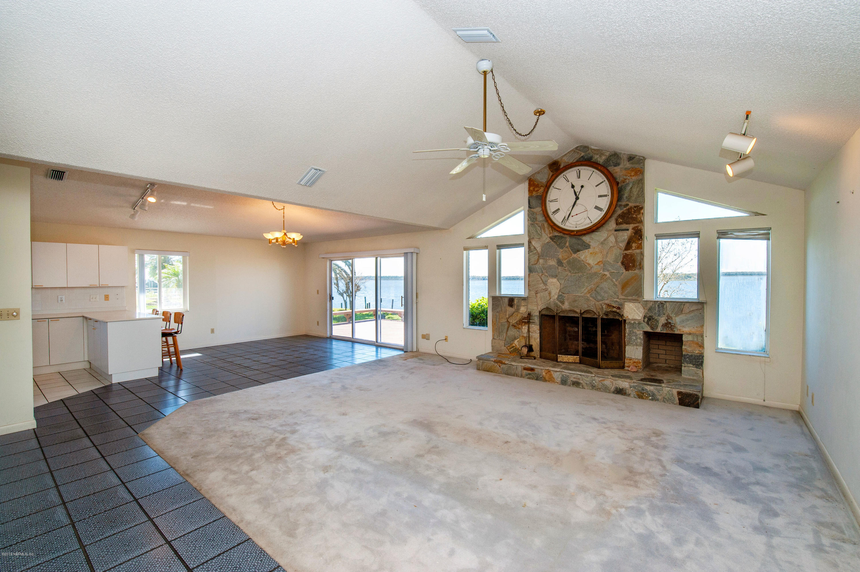 6333 Salado Road St. Augustine, FL 32080 - Photo 7 of 33 a view of a room with shelves and windows