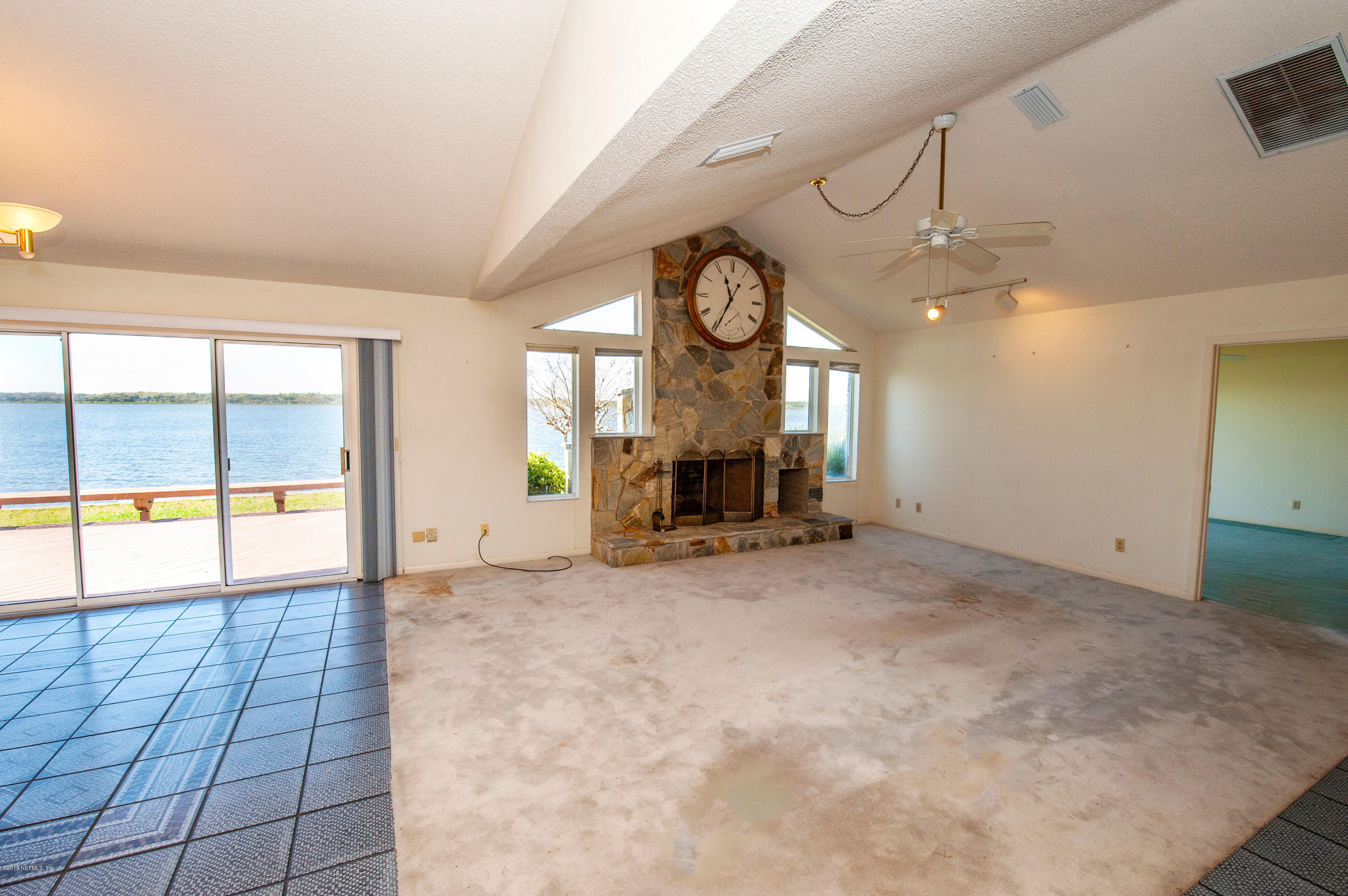 6333 Salado Road St. Augustine, FL 32080 - Photo 8 of 33 a view of a livingroom with a furniture and a large window