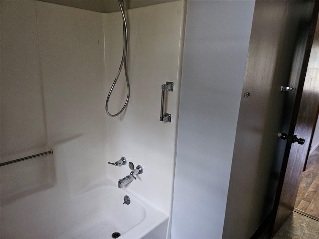 2835 Springdale Road, Unit B Snellville, GA 30039 - Photo 16 of 21 a bathroom with a bath tub
