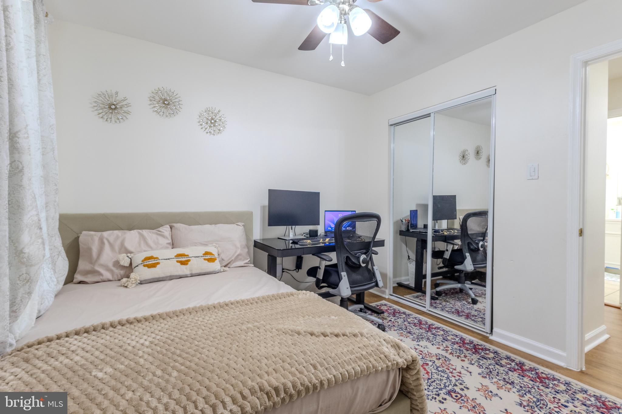 7530 Haystack Drive Windsor Mill, MD 21244 - Photo 15 of 30 a bed room with a bed and a television