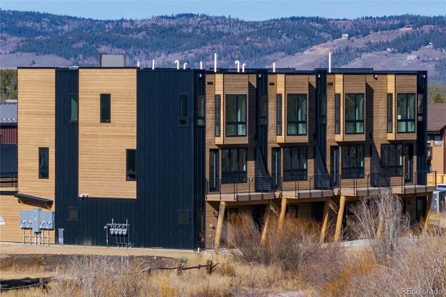 a view of a house with lake view