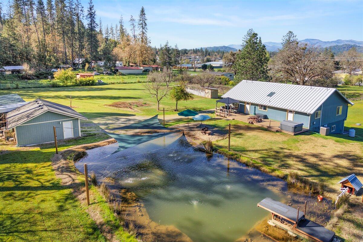 649 Pleasant Valley Road Merlin, OR 97532 - Photo 50 of 57 a view of a lake with houses