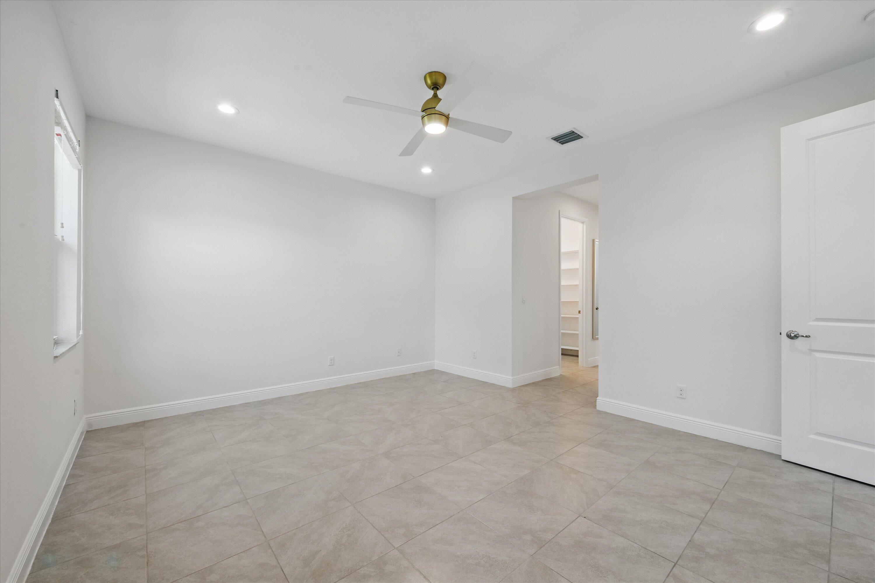 879 Ember Ridge Run Loxahatchee, FL 33470 - Photo 16 of 38 26-Master Bedroom