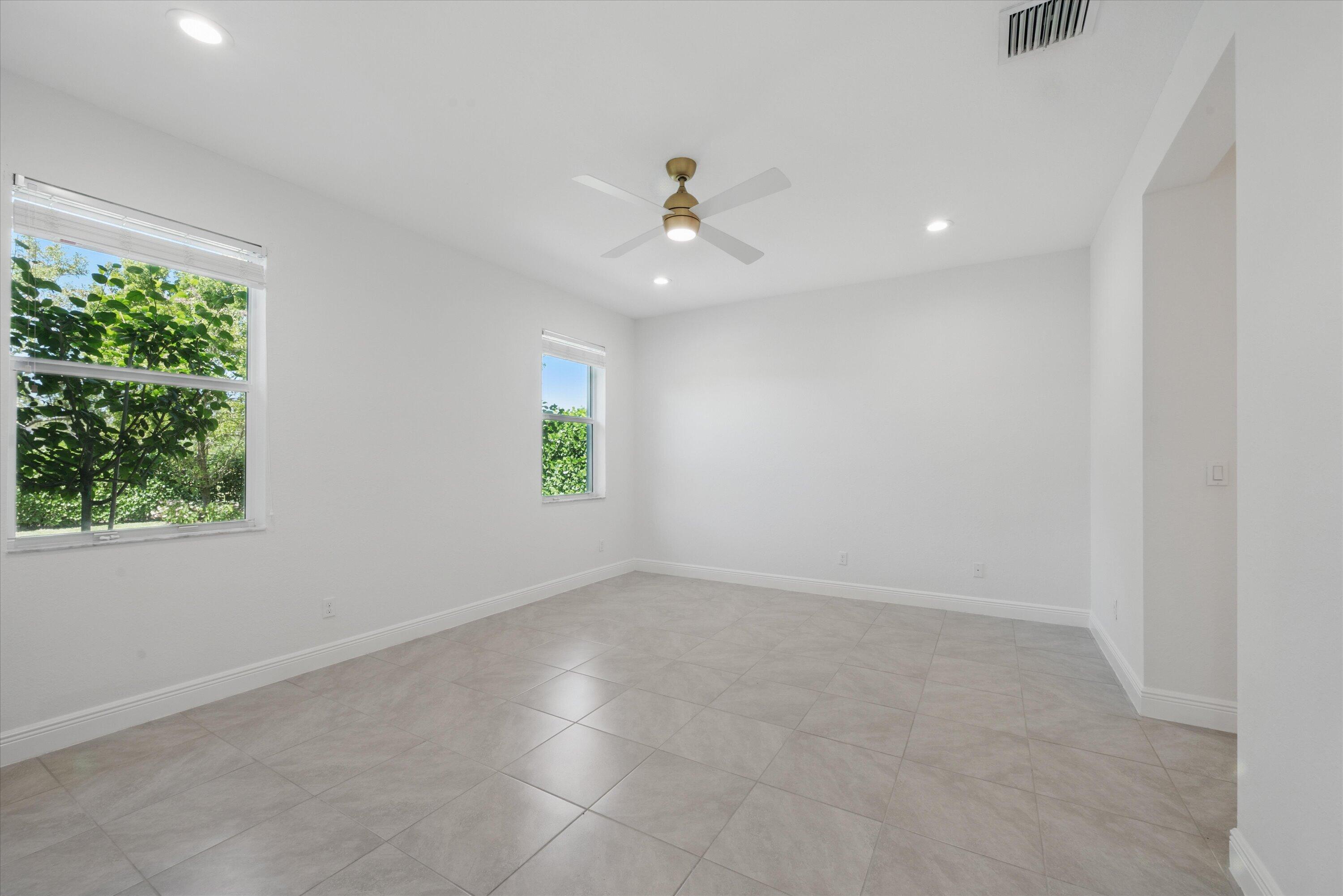 879 Ember Ridge Run Loxahatchee, FL 33470 - Photo 17 of 38 24-Master Bedroom