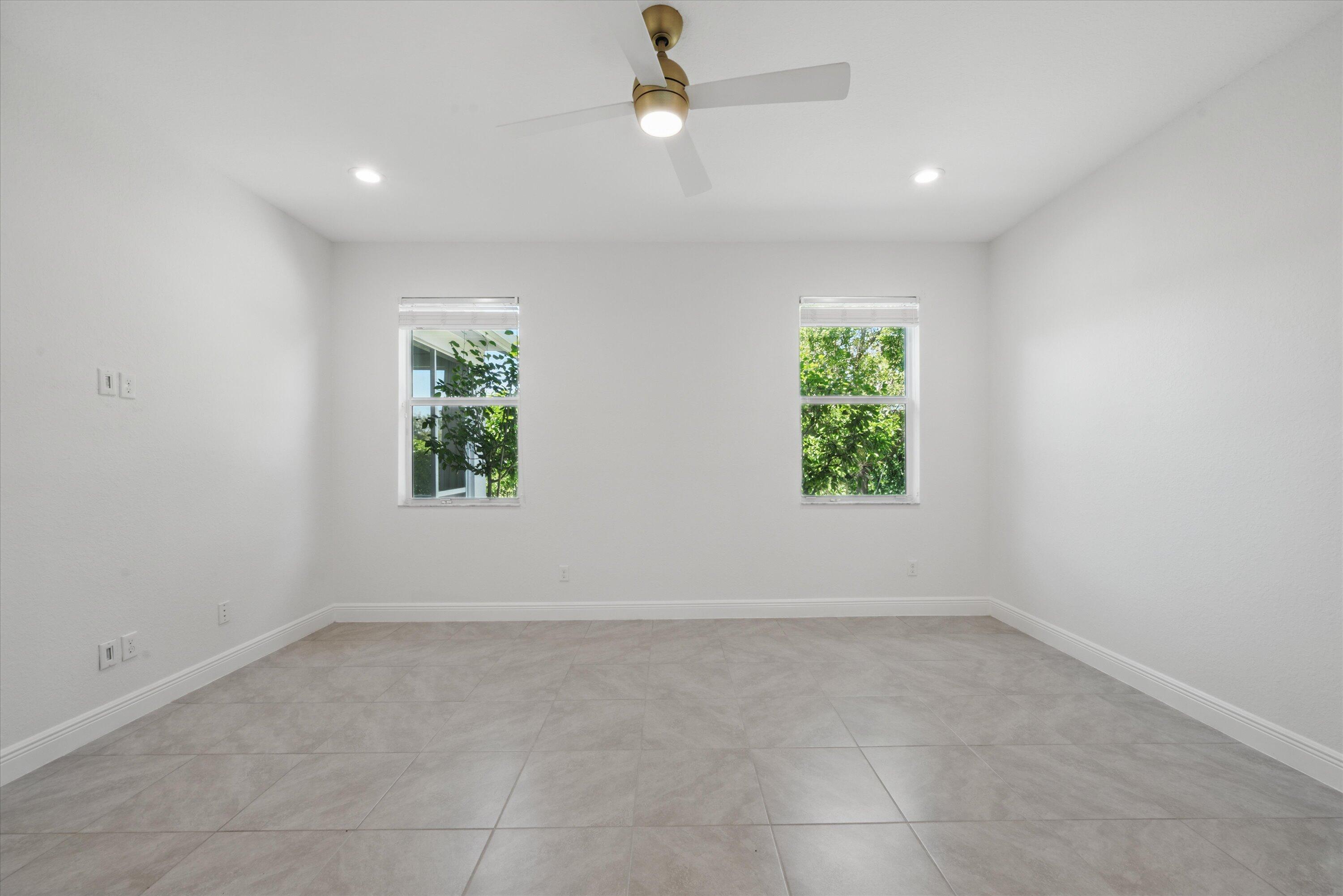 879 Ember Ridge Run Loxahatchee, FL 33470 - Photo 18 of 38 23-Master Bedroom