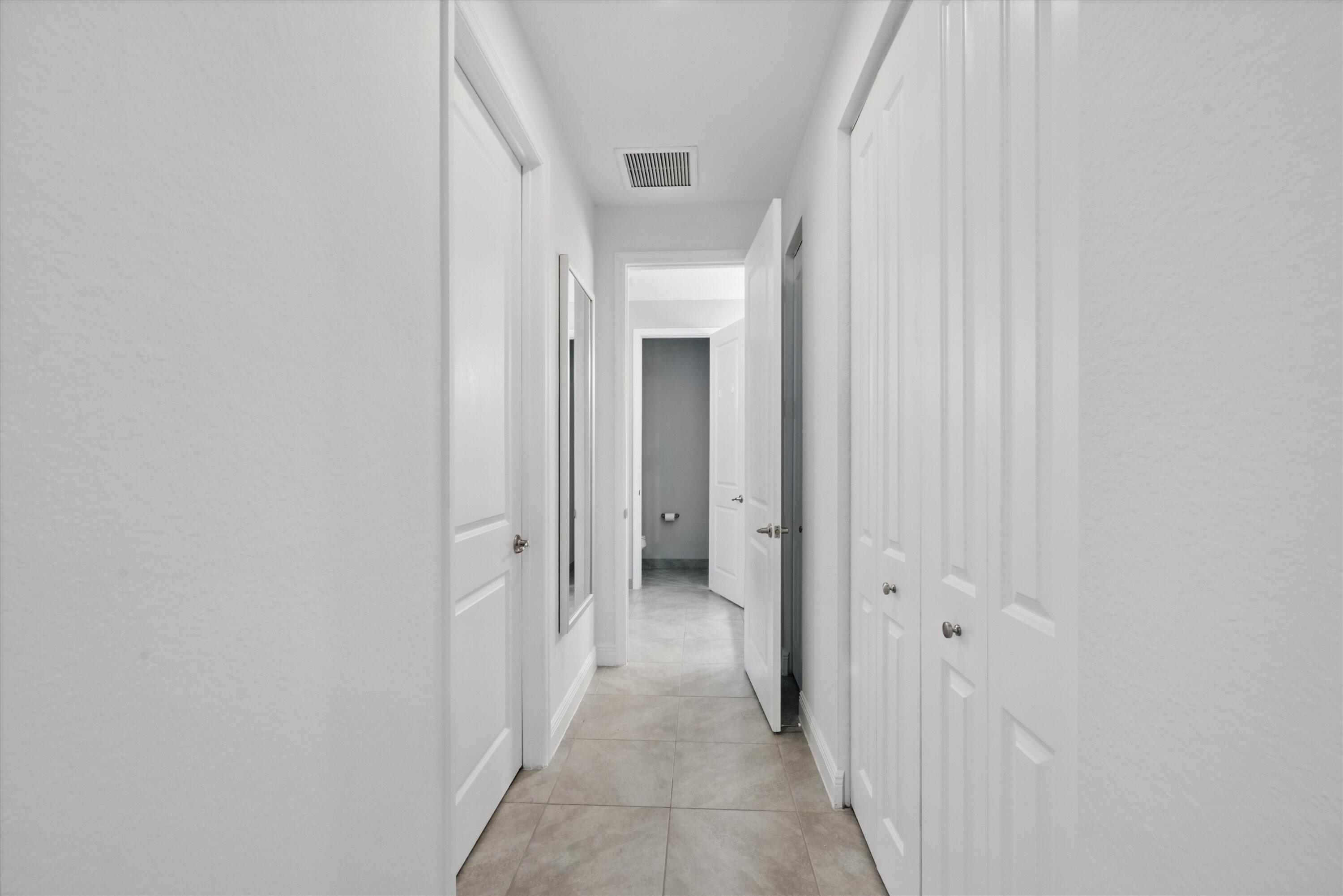 879 Ember Ridge Run Loxahatchee, FL 33470 - Photo 19 of 38 25-Master Bedroom