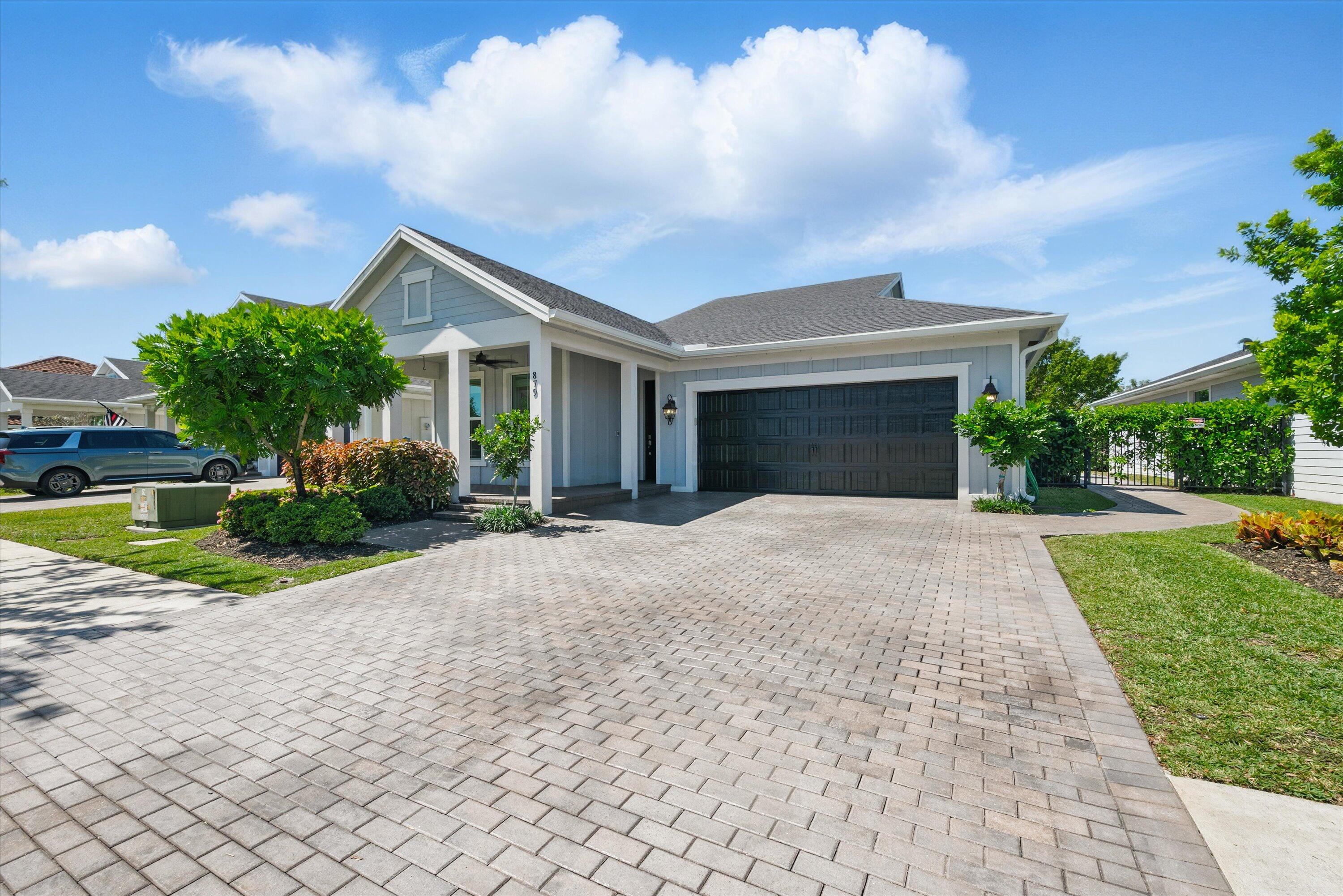 879 Ember Ridge Run Loxahatchee, FL 33470 - Photo 2 of 38 02-Exterior Front