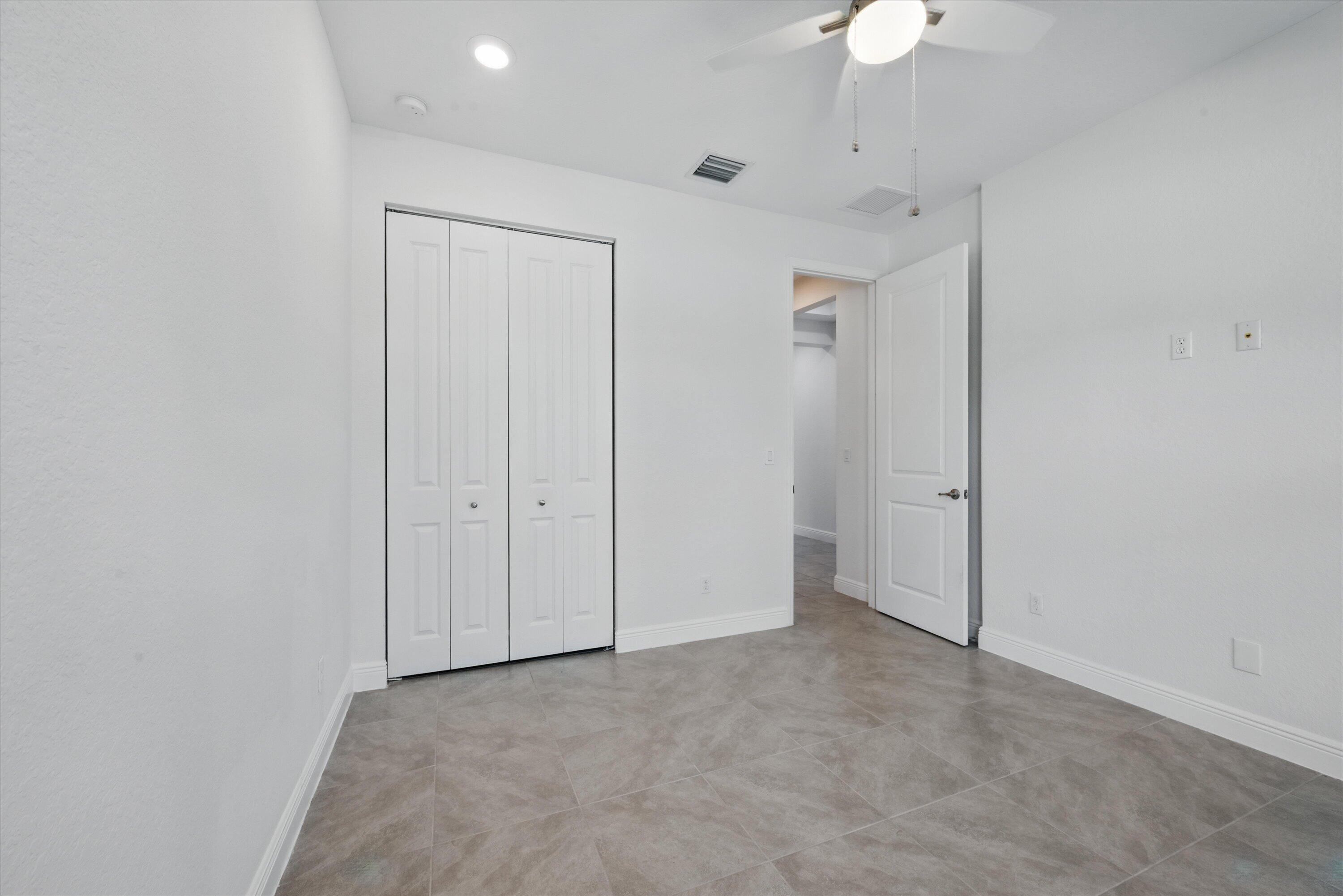 879 Ember Ridge Run Loxahatchee, FL 33470 - Photo 27 of 38 19-Bedroom