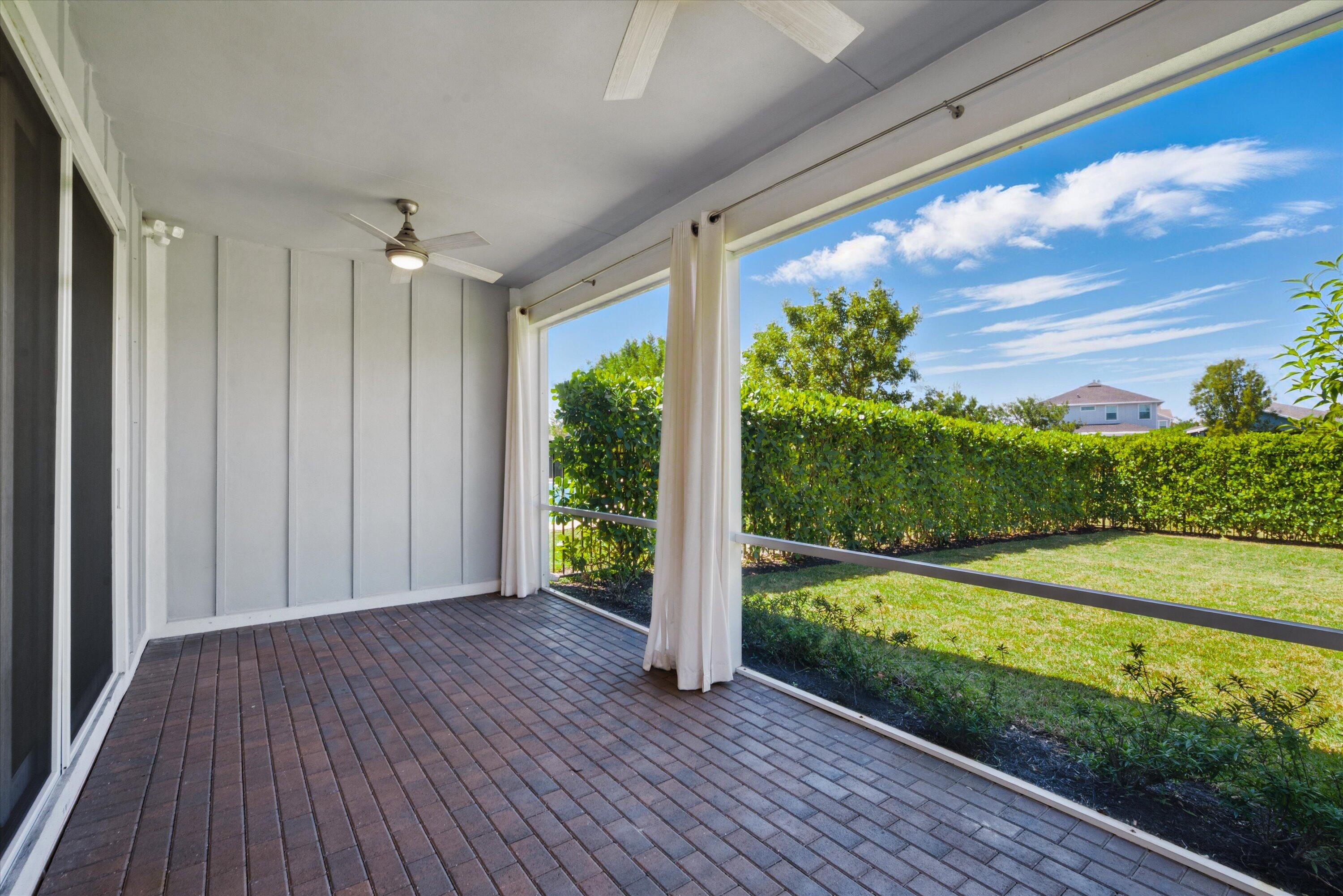 879 Ember Ridge Run Loxahatchee, FL 33470 - Photo 32 of 38 32-Screened Porch