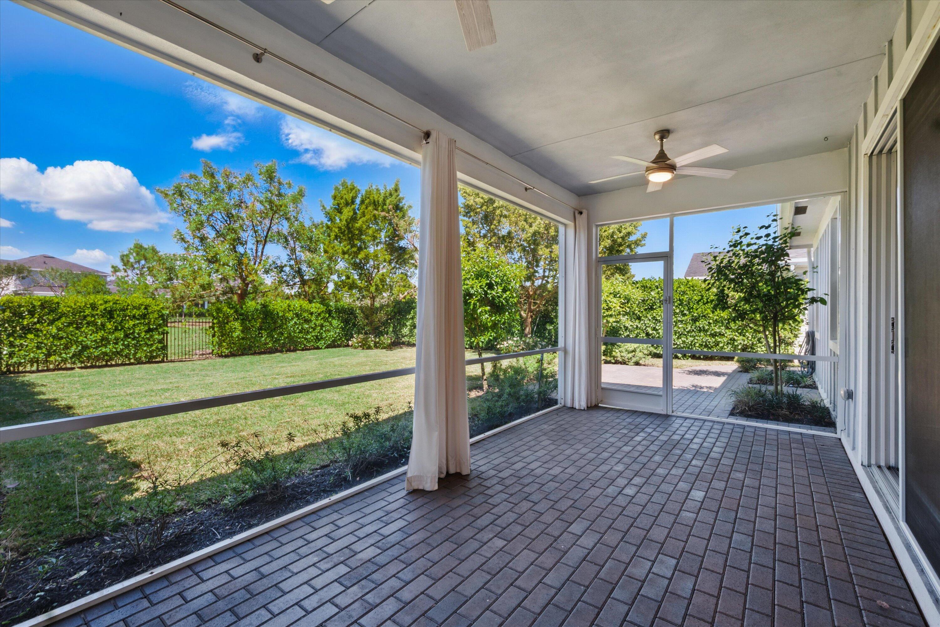 879 Ember Ridge Run Loxahatchee, FL 33470 - Photo 33 of 38 33-Screened Porch