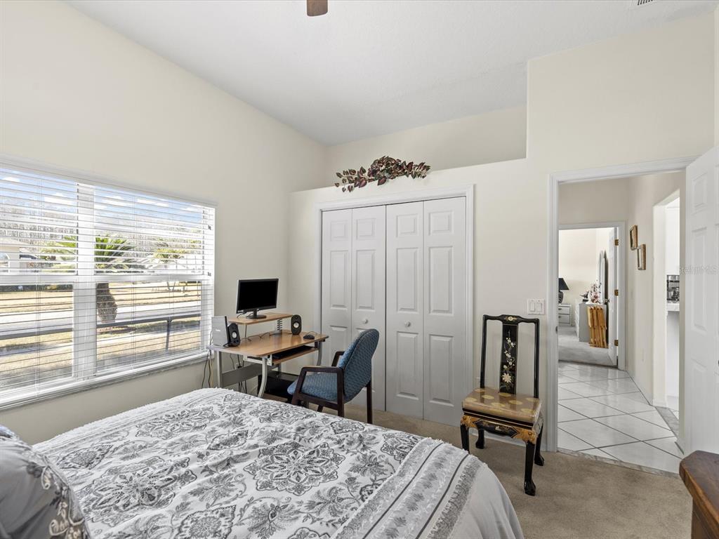 8704 Cypress Lakes Boulevard New Port Richey, FL 34653 - Photo 30 of 43 a view of a workspace with furniture and a window