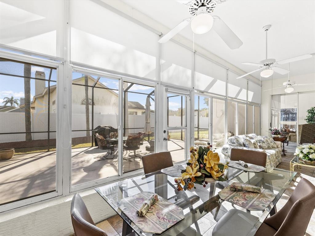 8704 Cypress Lakes Boulevard New Port Richey, FL 34653 - Photo 32 of 43 a very nice looking living room with a large window and furniture