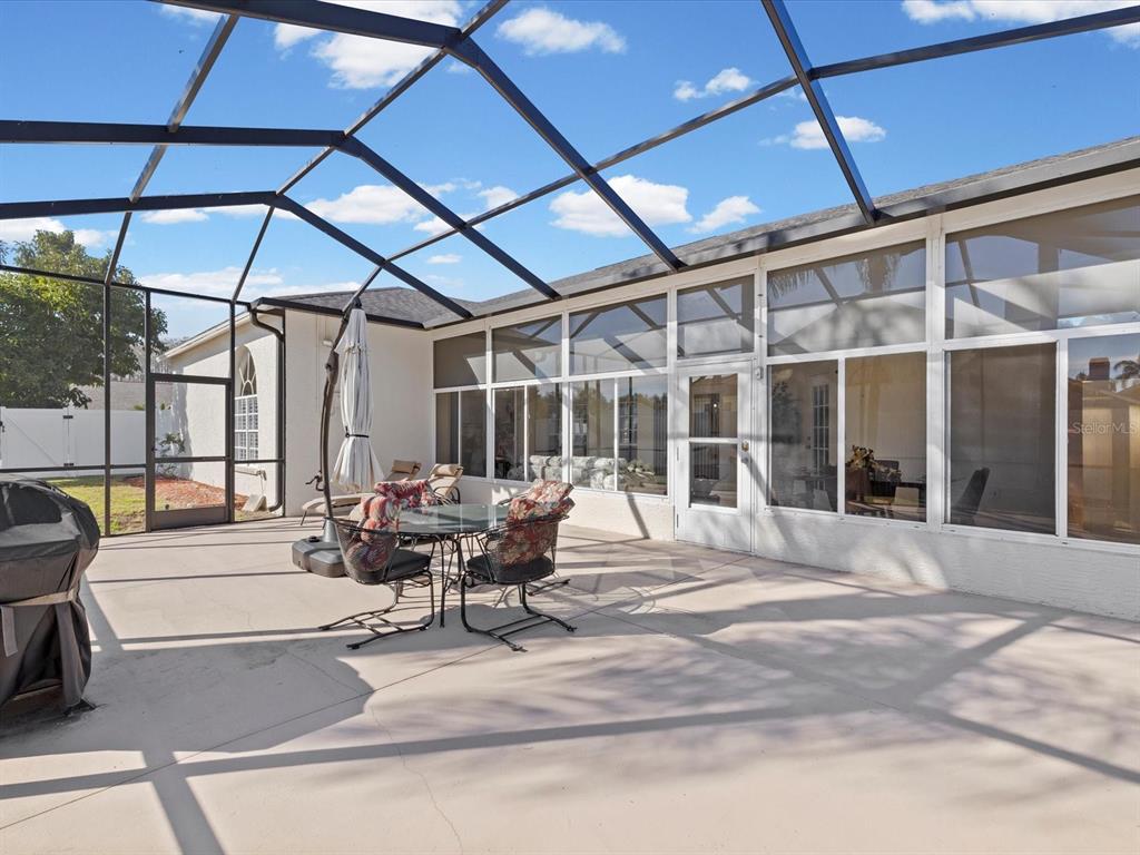 8704 Cypress Lakes Boulevard New Port Richey, FL 34653 - Photo 33 of 43 a living room with furniture