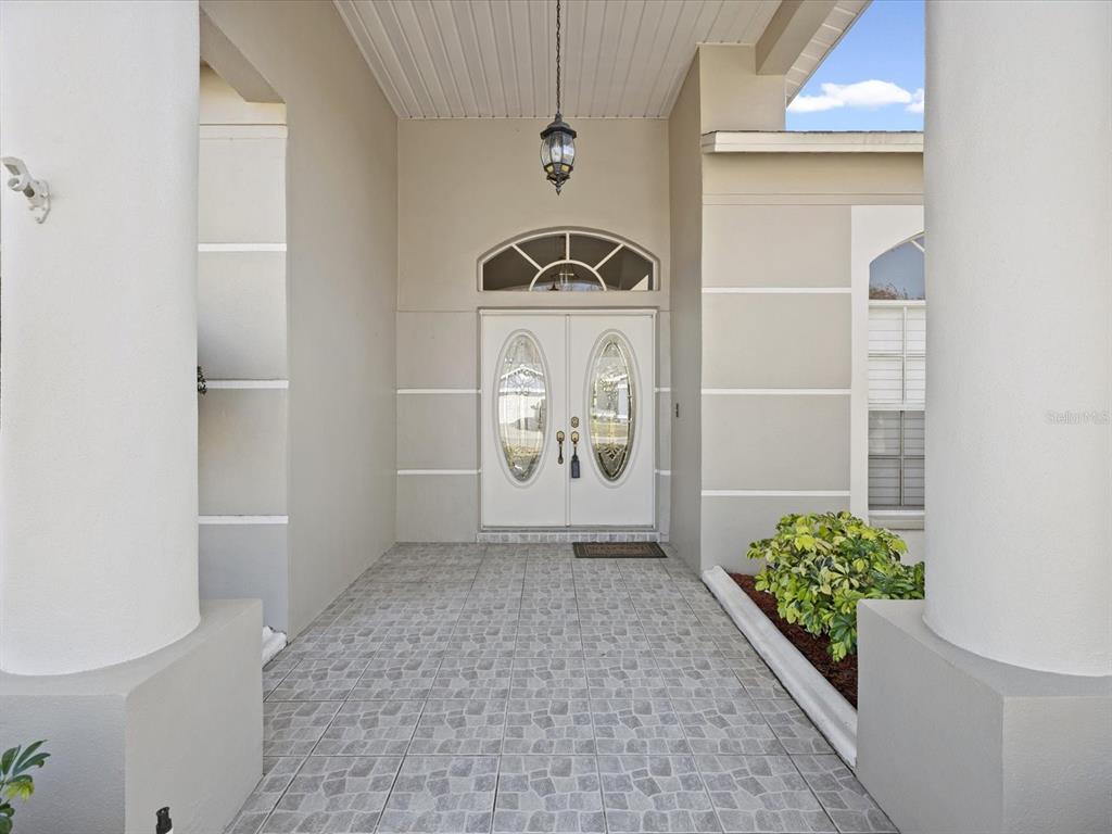 8704 Cypress Lakes Boulevard New Port Richey, FL 34653 - Photo 8 of 43 a view of entryway with interior