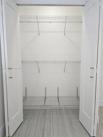 a view of a room with racks on the wall