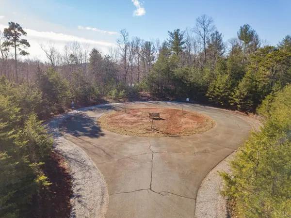 a view of a backyard of the house
