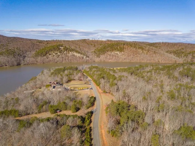 an aerial view of house with yard