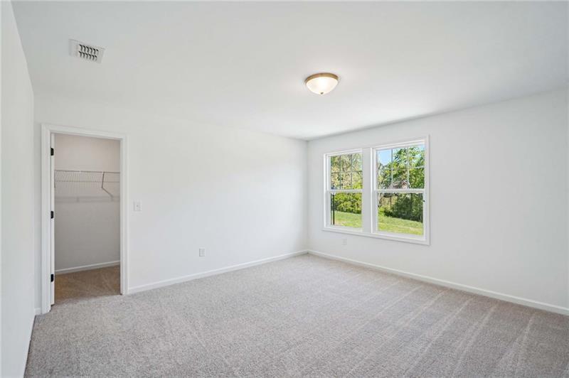 240 Silverleaf Trail Bethlehem, GA 30620 - Photo 15 of 35 a view of an empty room with a window
