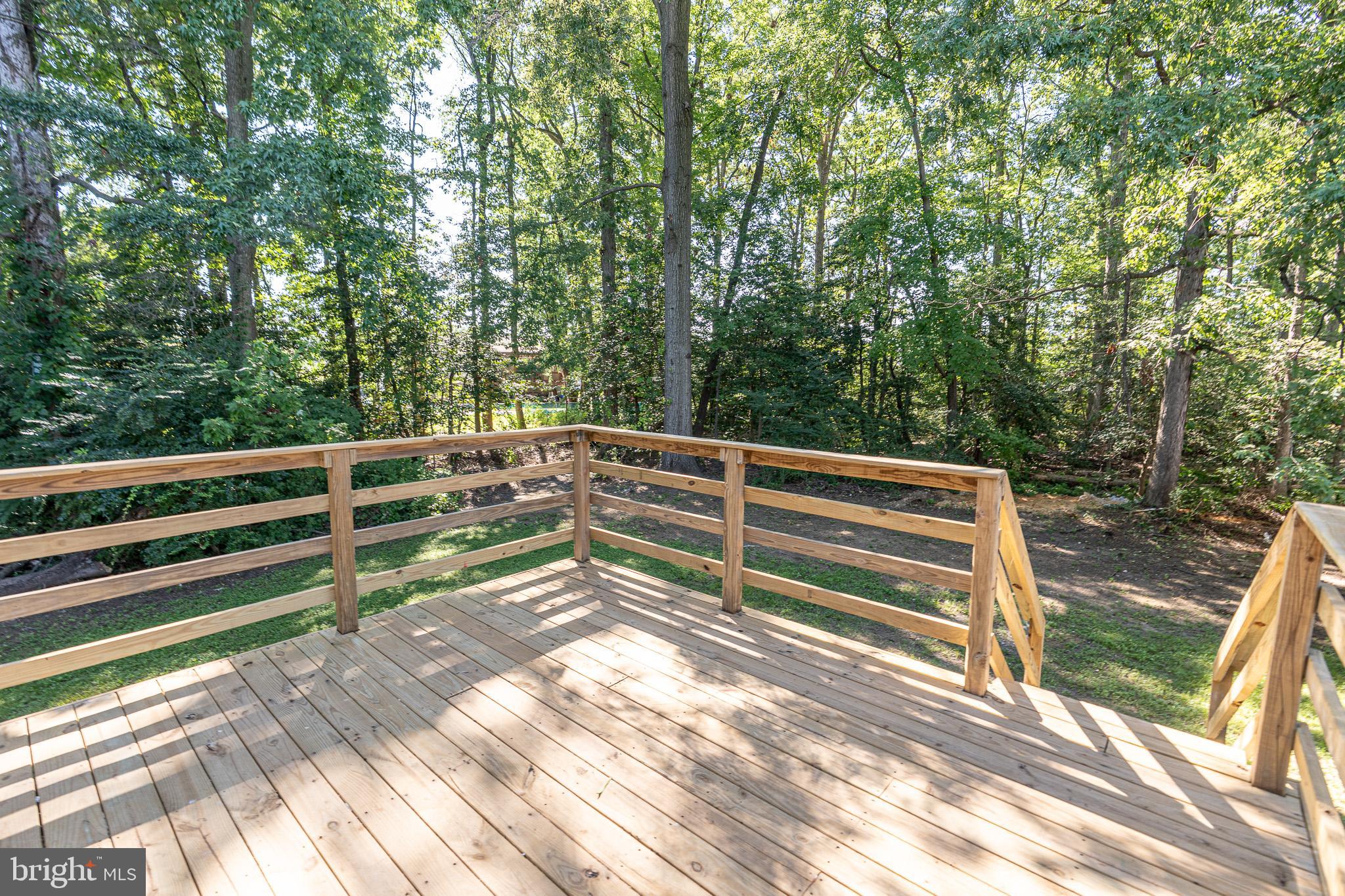 514 Holly Hunt Road Middle River, MD 21220 - Photo 32 of 32 a view of backyard with deck and wooden floor