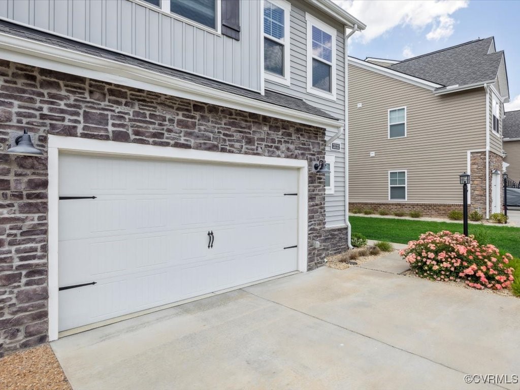 3232 Gannet Lane Midlothian, VA 23112 - Photo 12 of 48 a backyard of a house with potted plants