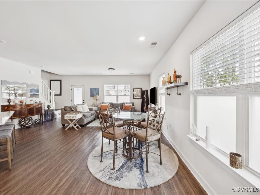 3232 Gannet Lane Midlothian, VA 23112 - Photo 16 of 48 a view of a dining room with furniture window and wooden floor
