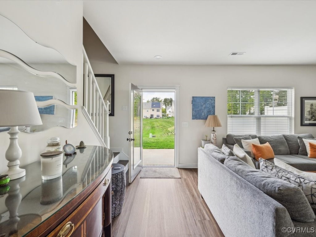 3232 Gannet Lane Midlothian, VA 23112 - Photo 19 of 48 a living room with furniture and a large window