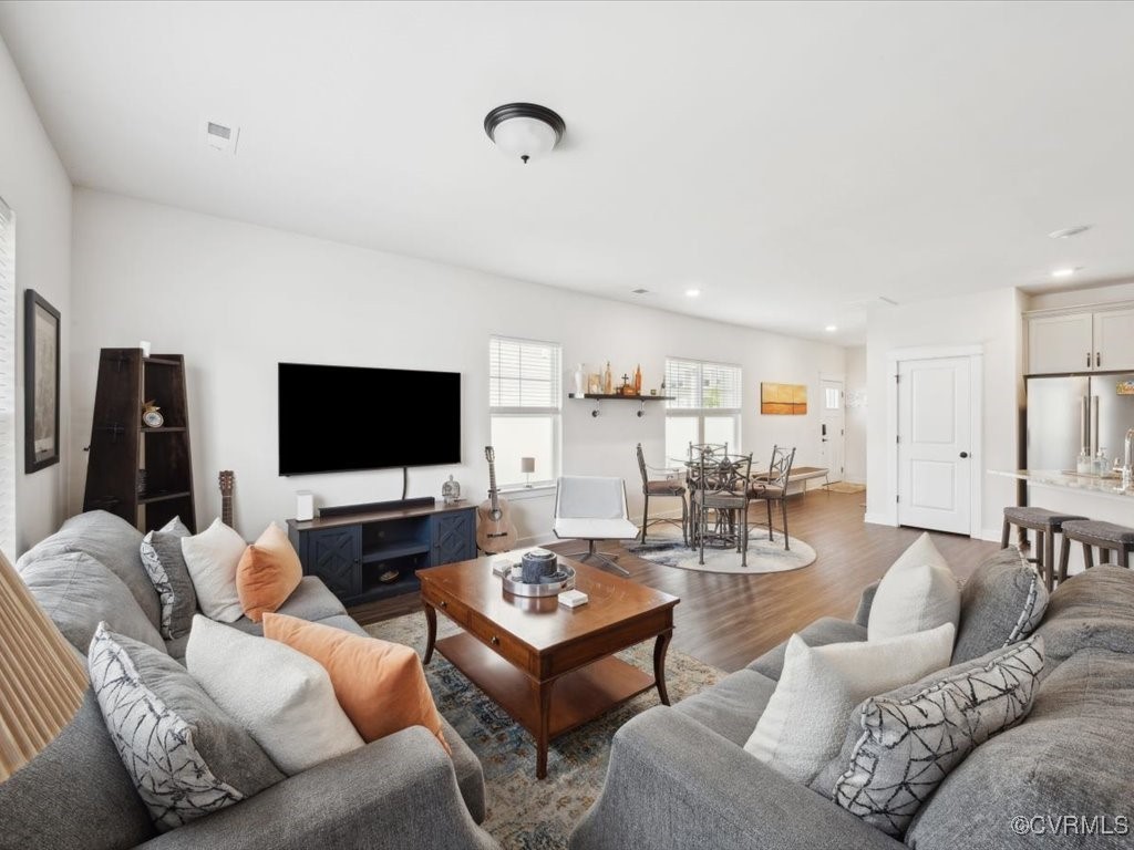 3232 Gannet Lane Midlothian, VA 23112 - Photo 20 of 48 a living room with furniture and a flat screen tv