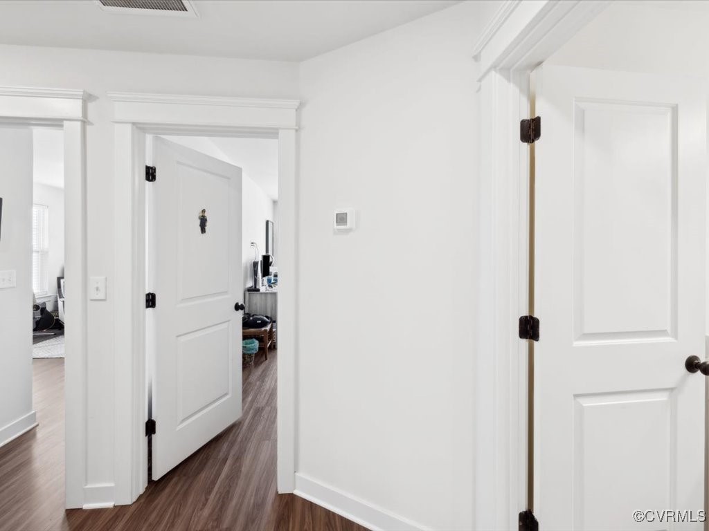 3232 Gannet Lane Midlothian, VA 23112 - Photo 23 of 48 a view of a hallway with wooden floor
