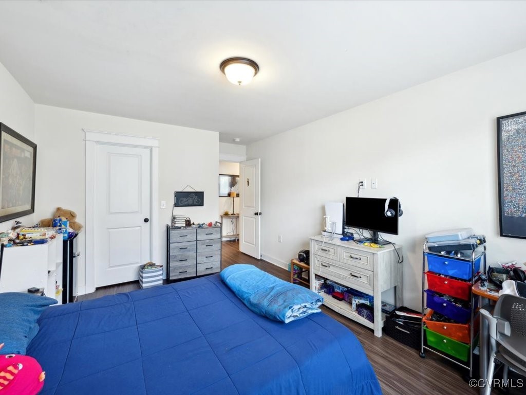 3232 Gannet Lane Midlothian, VA 23112 - Photo 30 of 48 a bedroom with furniture and a flat screen tv