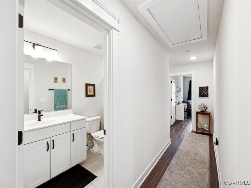 3232 Gannet Lane Midlothian, VA 23112 - Photo 31 of 48 a en suite bathroom with a double vanity sink a mirror and a shower