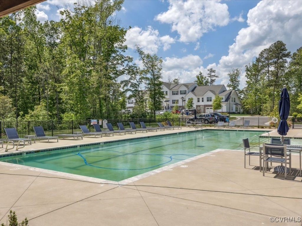 3232 Gannet Lane Midlothian, VA 23112 - Photo 46 of 48 a view of a lake with houses