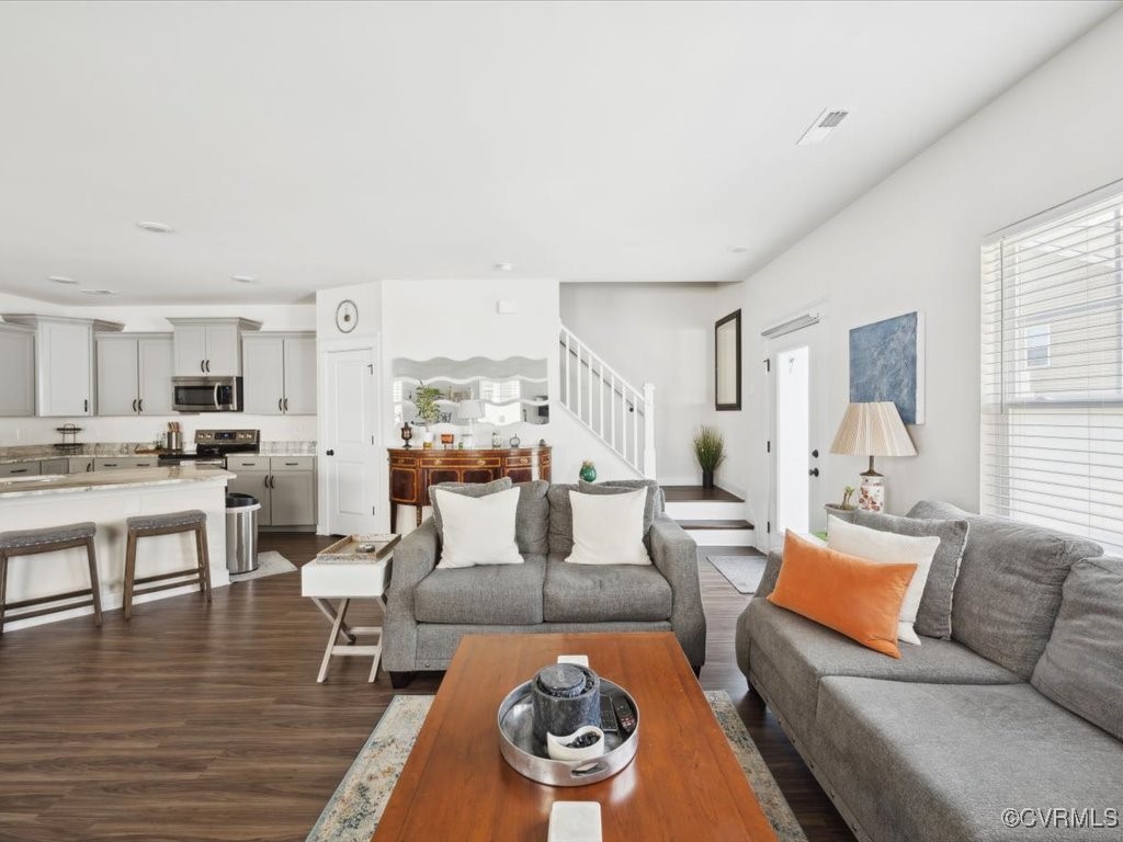 3232 Gannet Lane Midlothian, VA 23112 - Photo 6 of 48 a living room with furniture and a table