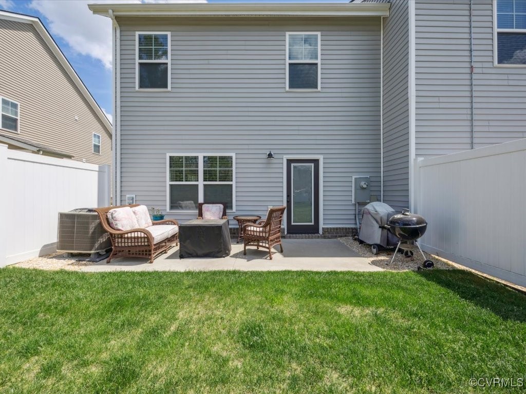 3232 Gannet Lane Midlothian, VA 23112 - Photo 9 of 48 a view of a patio with a table and chairs