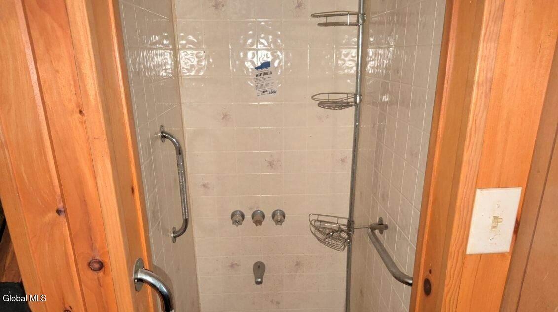 273 Whitney Street Moriah, NY 12974 - Photo 29 of 30 shower room down stairs