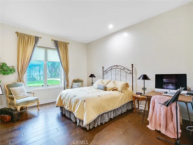 an aerial view of multiple houses with yard