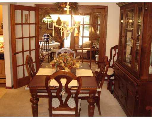 279 McWilliams Road Level Green, PA 15085 - Photo 4 of 16 Dining Room. 11 x 10 Formal Dining Room Features Neutral Wall to Wall Carpeting, Overhead Lighting, Beautiful 15 Panel Wood French Doors to the Attached 4 Seasons Room!