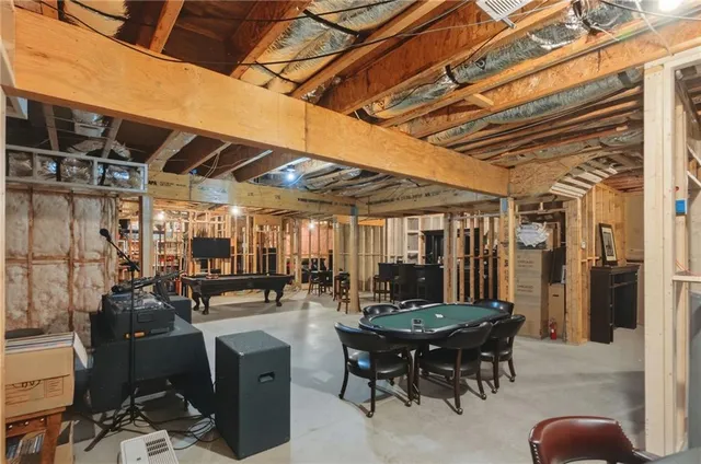 a view of a dinning table and chairs in the patio
