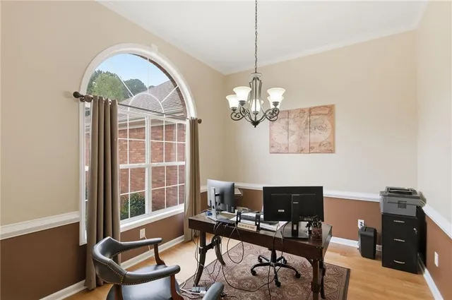 a workspace with chandelier