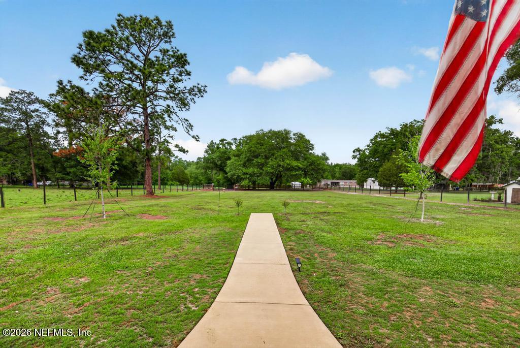 2955 Carroll Corner Road Hilliard, FL 32046 - Photo 15 of 106 a view of a park with large trees