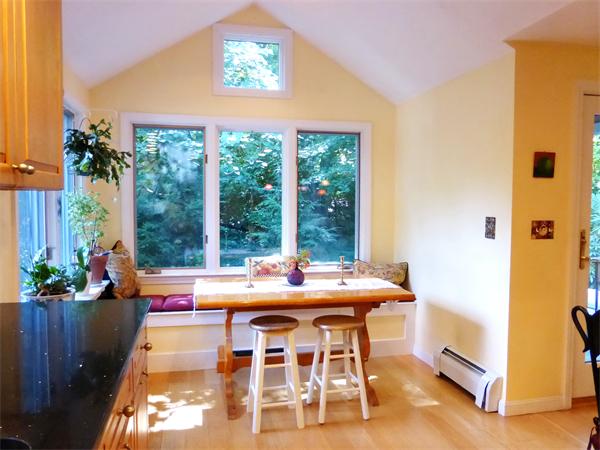 69 Concord Road Acton, MA 01720 - Photo 5 of 25 a dining room with a table and chairs