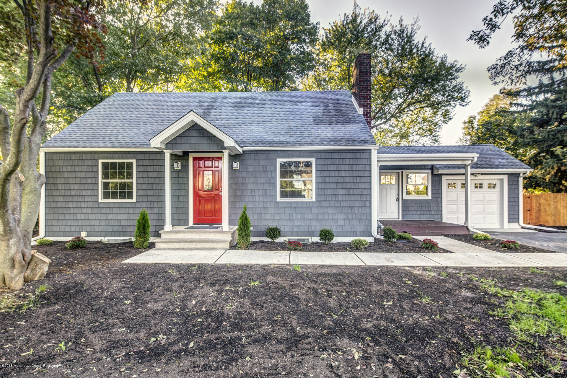 584 Colts Neck Road Freehold, NJ 07728 - Photo 1 of 29 a view of a house with a yard and large tree
