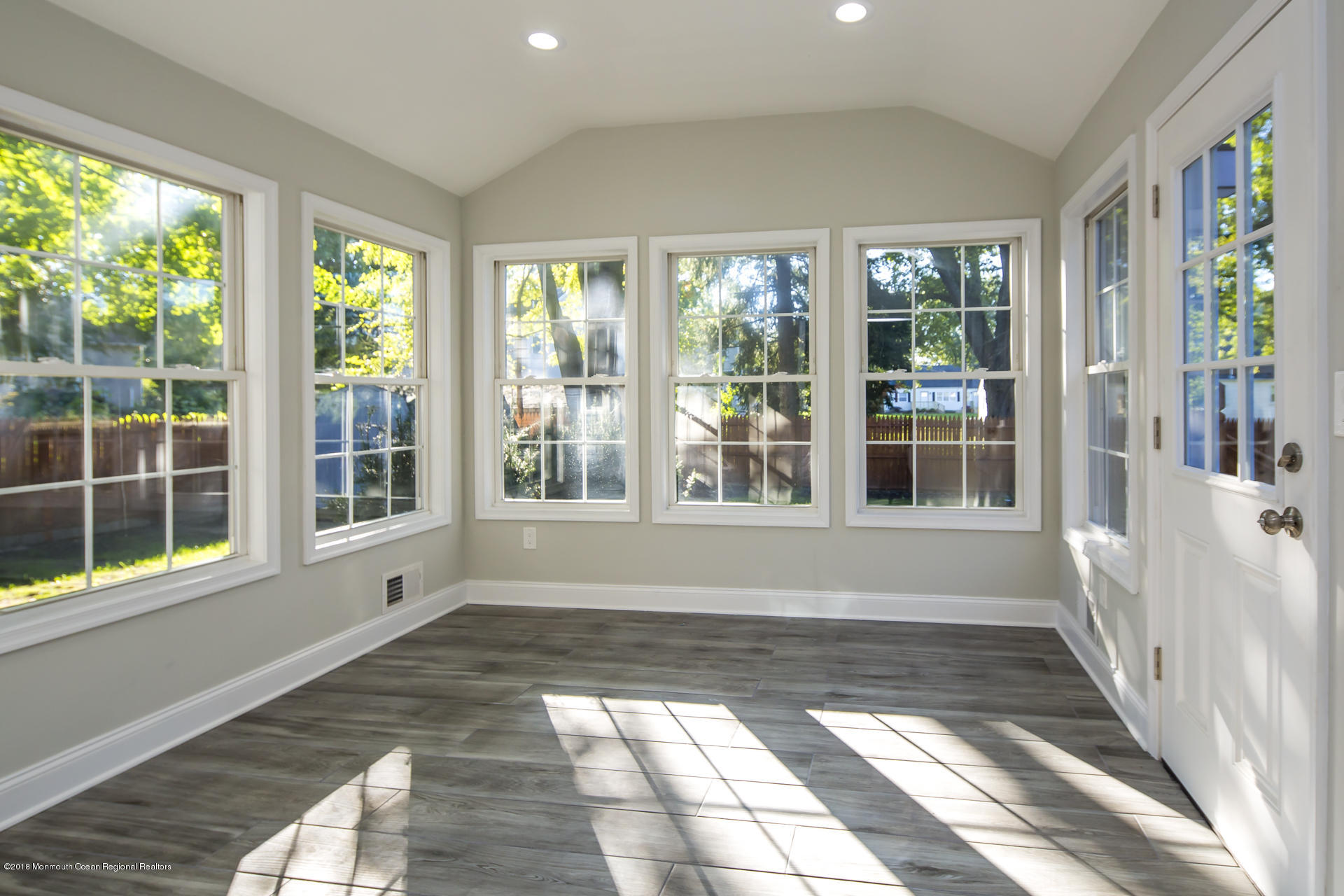 584 Colts Neck Road Freehold, NJ 07728 - Photo 15 of 29 a view of empty room with windows