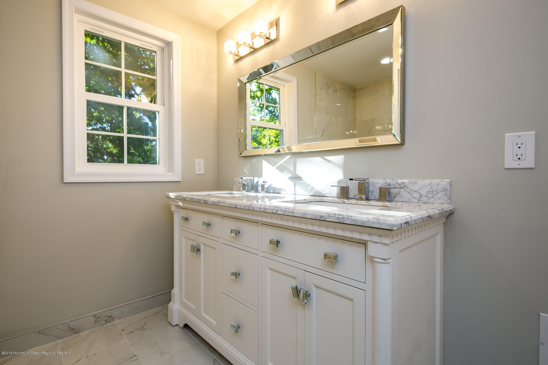 584 Colts Neck Road Freehold, NJ 07728 - Photo 20 of 29 a bathroom with a granite countertop sink and a mirror