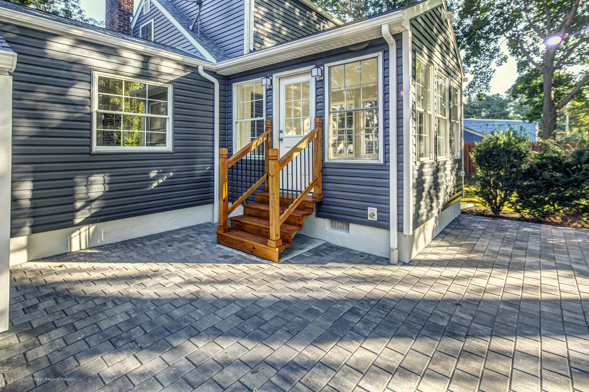584 Colts Neck Road Freehold, NJ 07728 - Photo 27 of 29 a view of a house with a yard